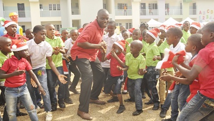 Pix:  Mr. Effy Okon, General Manager, Offshore Assets of the Shell Nigeria Exploration and Production Company Limited (SNEPCo), in a dance with pupils of the Innercity Mission School, Ikeja, Lagos, at the SNEPCo-sponsored 2015 Christmas party...